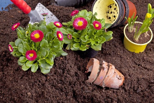 Gardener preparing tools at a garden site in Rotherhithe